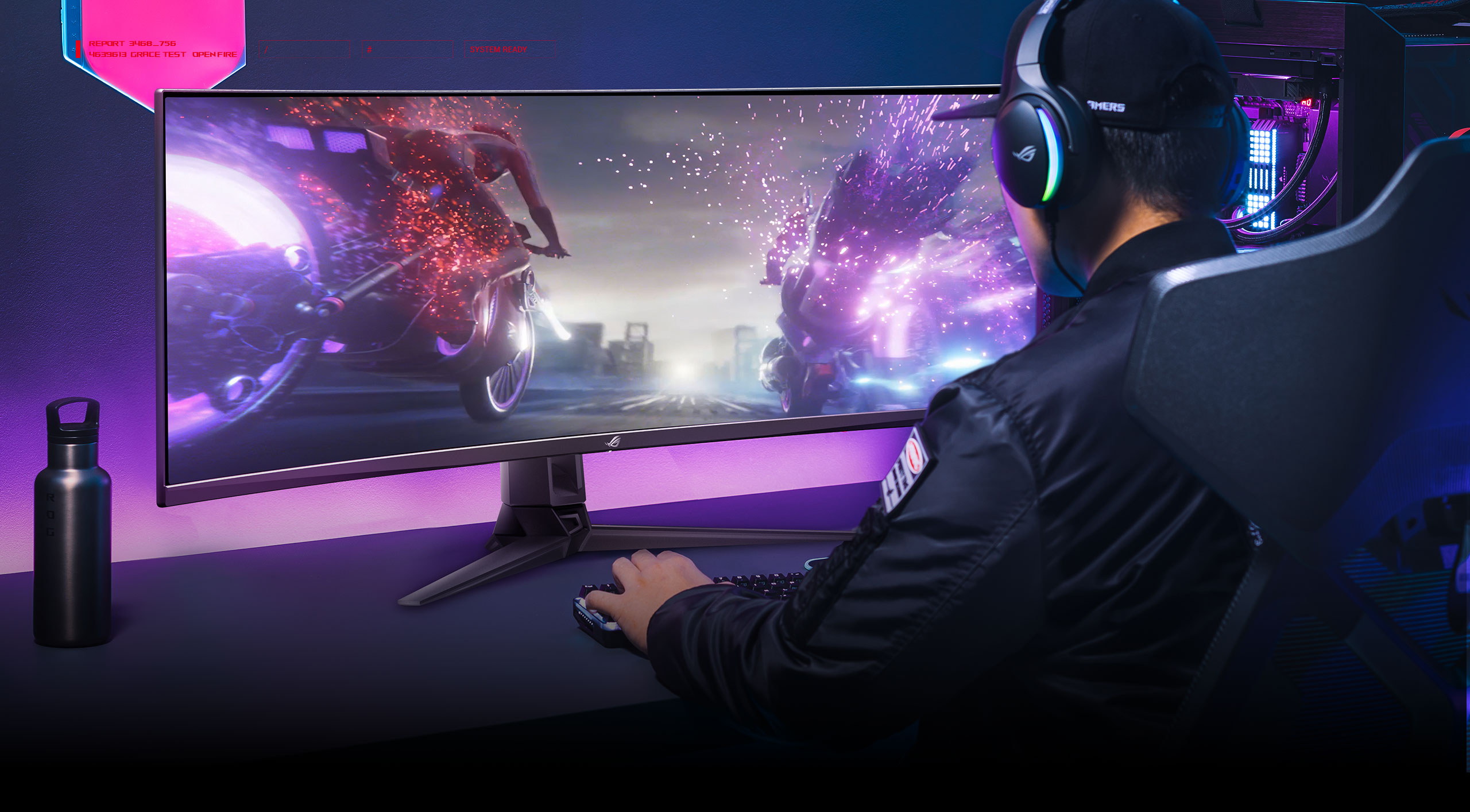 A man set in front of the PG49WCD monitor with his hands on keyboard.